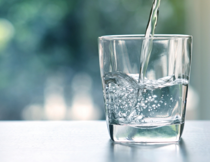 water pouring into a glass