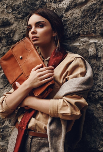 Model Posing with Handbag in Fancy Fall-like Attire